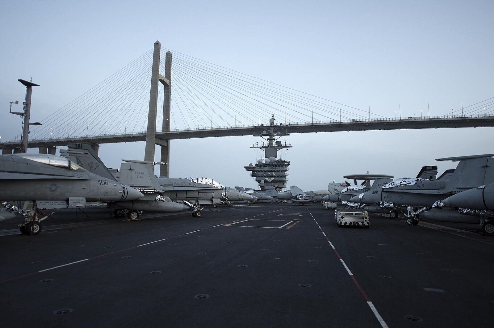 Aircraft Carrier | Love Hurtz A U.S. Navy aircraft carrier transits the Suez Canal with planes on its flight deck, representing challenges in betrayal.