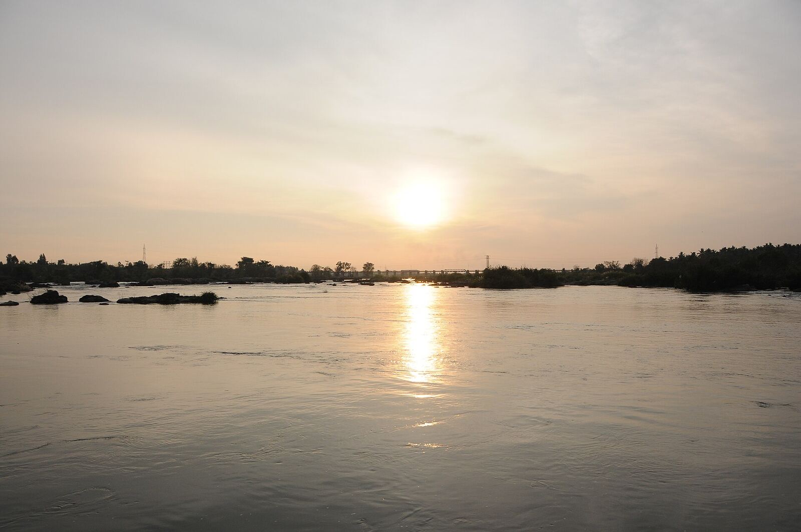 A calm river landscape at sunset offers a peaceful scene for processing grief and finding strength after betrayal.